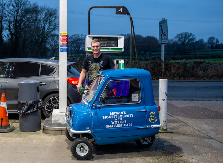Alex Orchin says it costs 'around £7 or so' to fill up his tiny car. (SWNS)