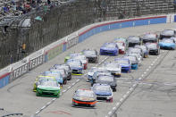 The field takes the green flag at the start of the NASCAR Xfinity Series auto race at Texas Motor Speedway in Fort Worth, Texas, Saturday, May 21, 2022. (AP Photo/Larry Papke)