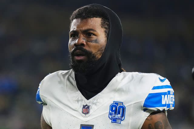 <p>Cooper Neill/Getty</p> Cameron Sutton, formerly of the Detroit Lions, walks off the field at Lambeau Stadium in September 2023