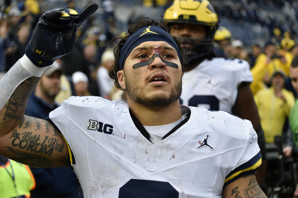 Michigan running back Blake Corum was bloodied after his team's win over Penn State, but ran for 145 yards and two touchdowns. (Randy Litzinger/Icon Sportswire via Getty Images)