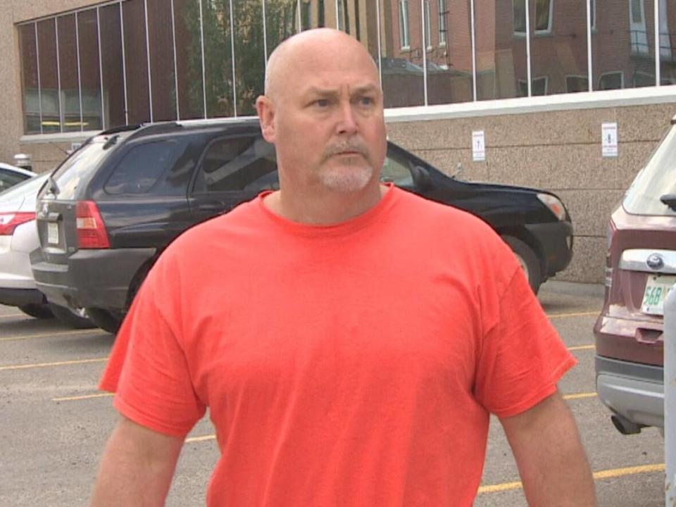 Christopher Duke is shown walking out of provincial court in Regina after his bail hearing on Aug. 9, 2019. (Kirk Fraser/CBC - image credit)