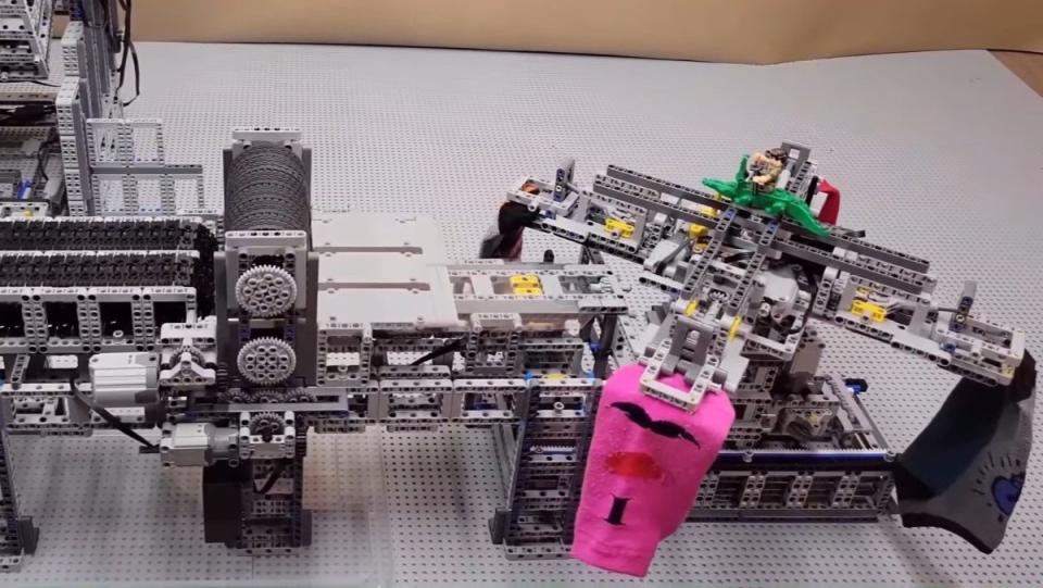 A LEGO Technic build spins socks