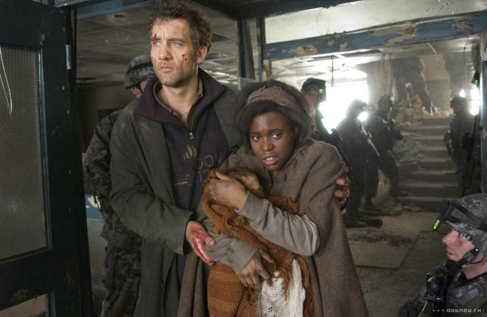 Clive Owen and Clare-Hope Ashitey seek a safe haven in ‘Children Of Men’. (Universal)