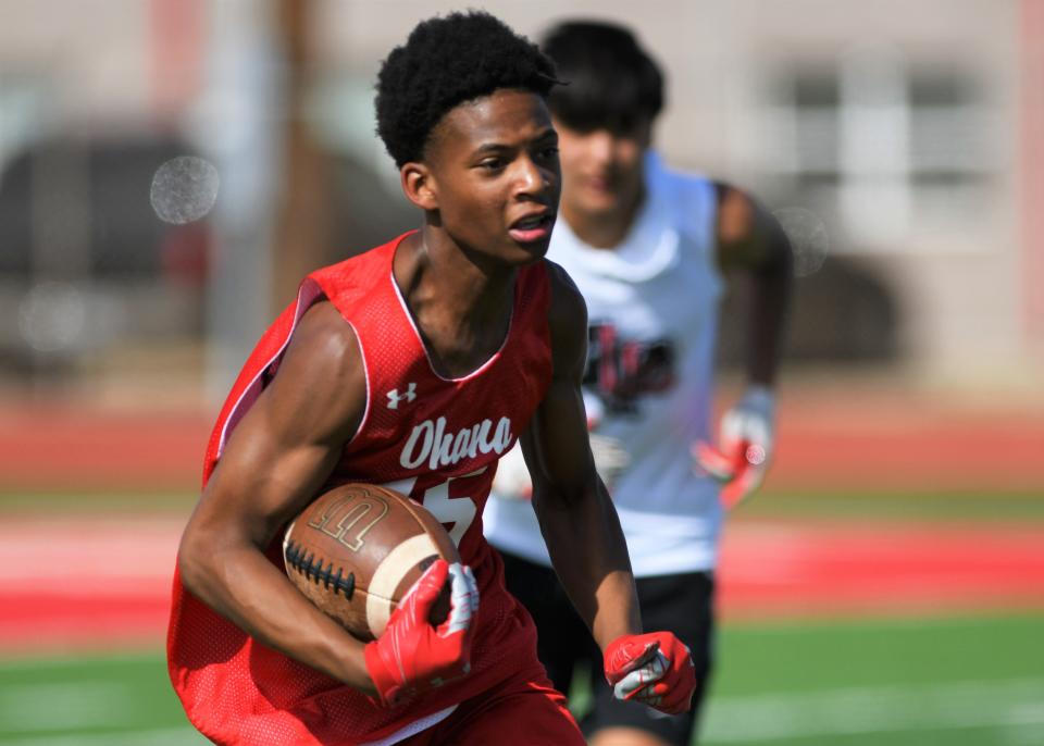Coronado's Willie Crain runs with the ball after an interception in a 7-on-7 game against Levelland on Monday, June 20, 2022, at Coronado High School in Lubbock.