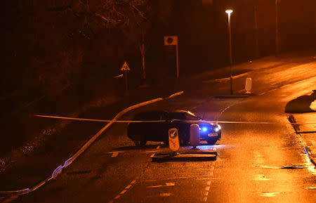 A police vehicle is seen at a cordoned off area, where a truck (unseen) was hijacked and believed to contain a suspicious device, at the scene of a security alert in Northland, Londonderry, Northern Ireland, January 21, 2019. REUTERS/Clodagh Kilcoyne
