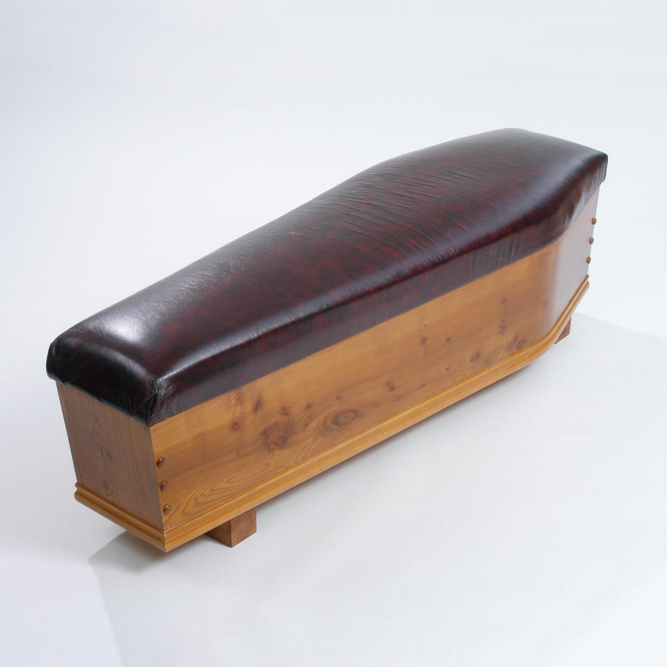 A coffin in the shape of a bench in a church. (Photo: Caters News)