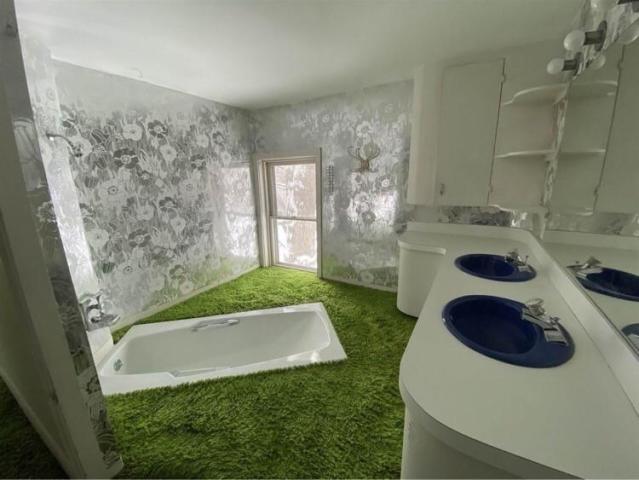 You guys hate carpet in the bathroom? I can one up that. My parents have a  bathroom with carpet that goes up the bathtub walls! Bonus points for the  terrible wallpaper. 