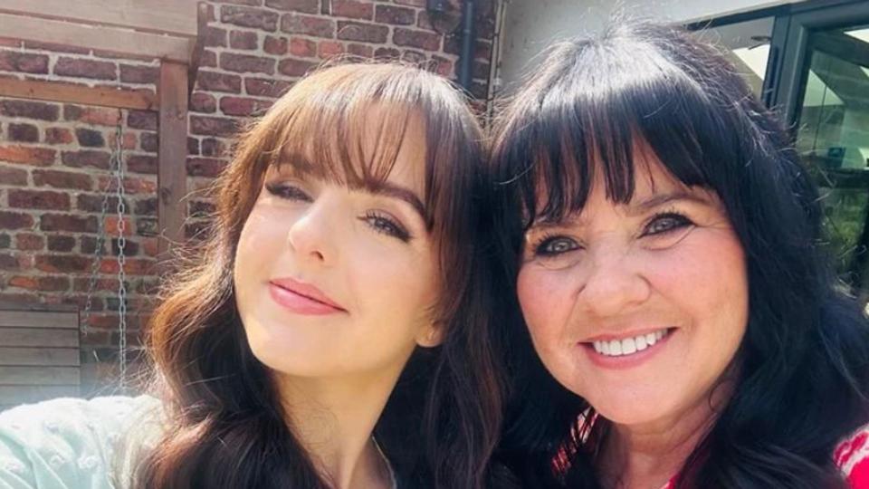 Coleen Nolan and daughter Ciara taking a selfie in a garden