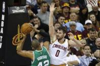 May 21, 2017; Cleveland, OH, USA; Boston Celtics center Al Horford (42) shoots on Cleveland Cavaliers forward Kevin Love (0) during the second half in game three of the Eastern conference finals of the NBA Playoffs at Quicken Loans Arena. Mandatory Credit: Rick Osentoski-USA TODAY Sports