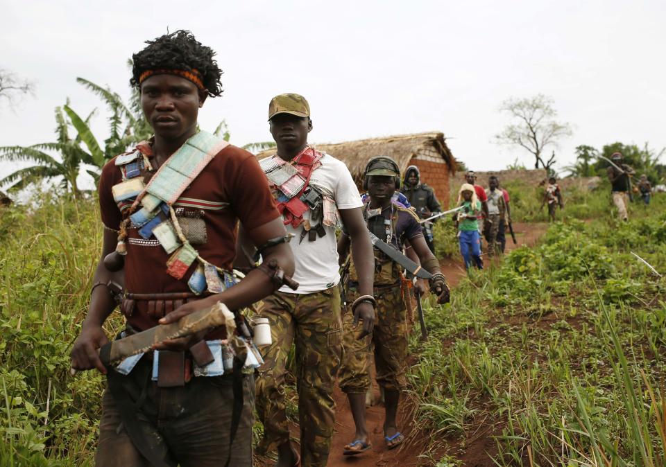 Members of the anti-balaka, a Christian militia, patrol outside the village of Zawa