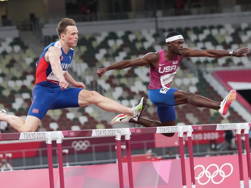 Karsten Warholm and Rai Benjamin compete in the 400-meter hurdles at the Tokyo Olympics.