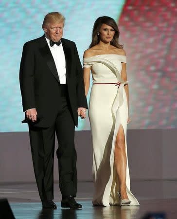 U.S. President Donald Trump and his wife first lady Melania Trump arrive at his "Liberty" Inaugural Ball in Washington, DC January 20, 2016. REUTERS/Brian Snyder