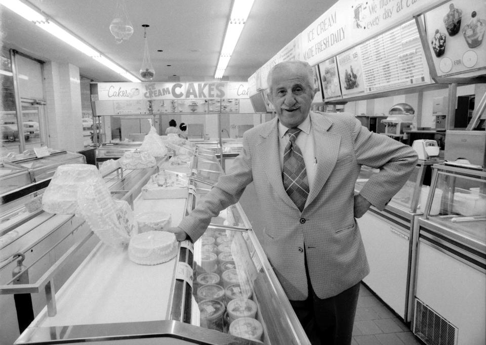 Tom Carvel, who began his business selling ice cream from a trailer during the Depression, stands behind the counter of a Carvel store in Yonkers, N.Y., on January 7, 1976.