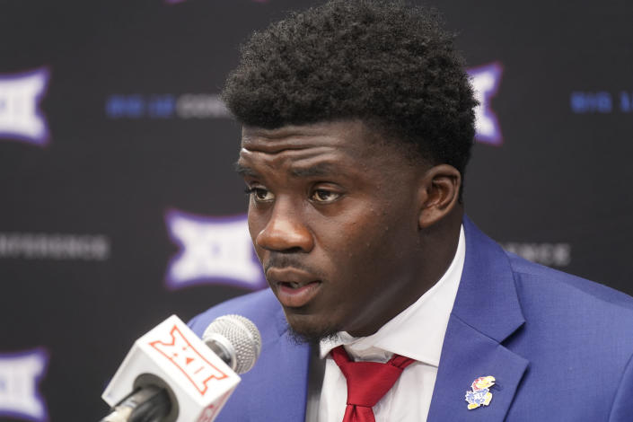 Kansas safety Kenny Logan Jr. speaks to reporters at the NCAA college football Big 12 media days in Arlington, Texas, Wednesday, July 13, 2022. (AP Photo/LM Otero)