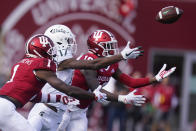 Indiana's Josh Sanguinetti (19) intercepts a pass intended for Michigan State's Tre Mosley (17) during the second half of an NCAA college football game, Saturday, Oct. 16, 2021, in Bloomington, Ind. Michigan State won 20-15. Devon Matthews (1) was also defending on the play, (AP Photo/Darron Cummings)