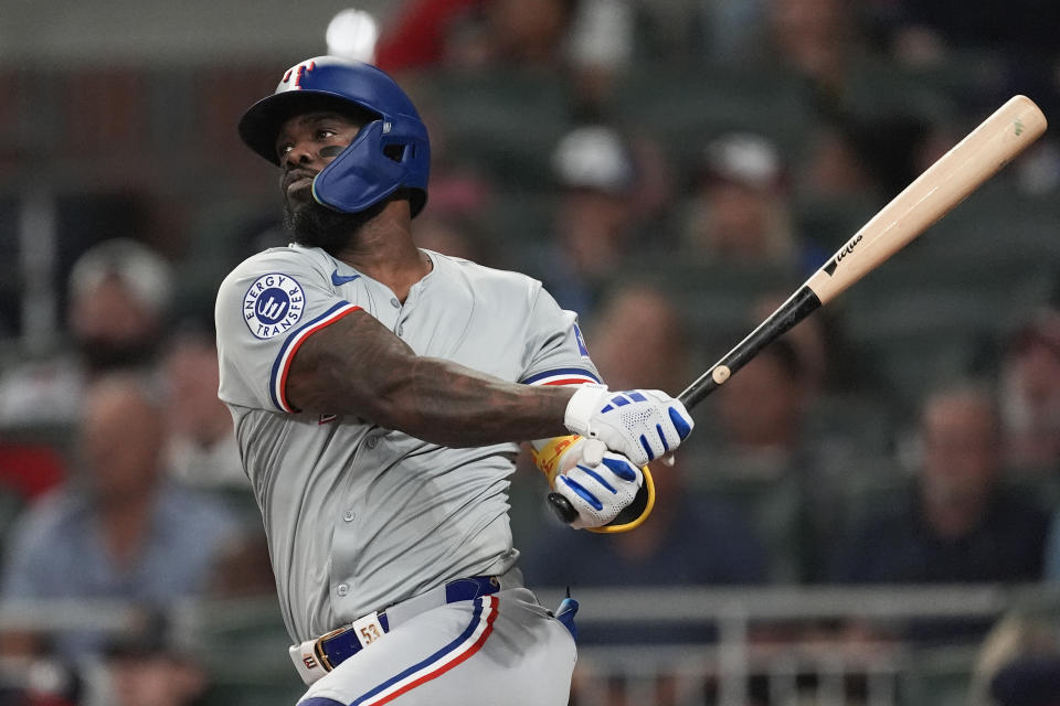 Adolis García will represent the home team Texas Rangers at MLB's Home Run Derby. (AP Photo/John Bazemore)