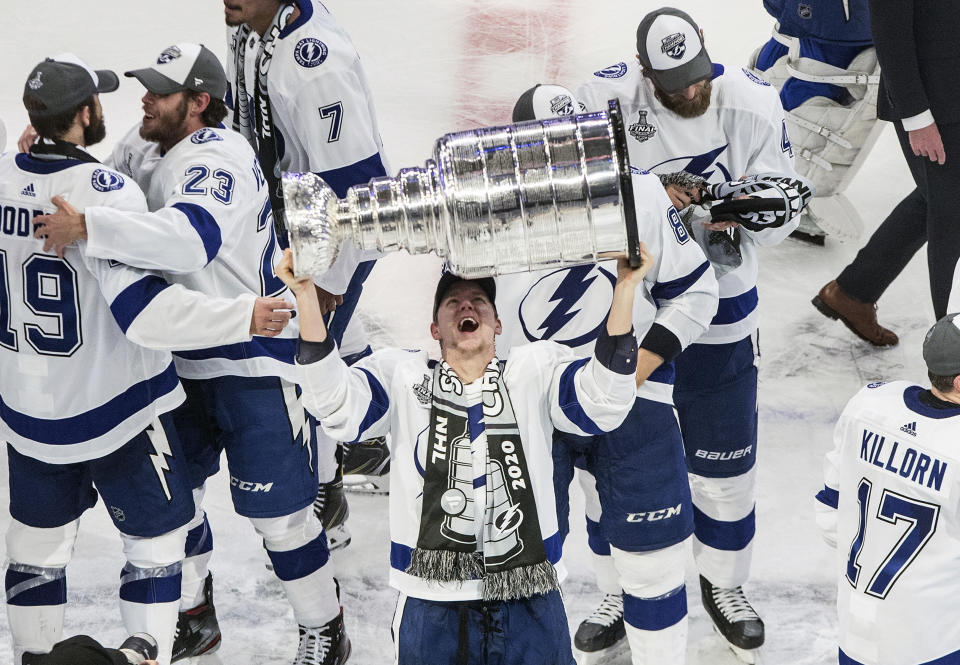 Tampa Bay Lightning's Ondrej Palat (18) hoists the Stanley Cup after defeating the Dallas Stars in the NHL Stanley Cup hockey finals, in Edmonton, Alberta, on Monday, Sept. 28, 2020. (Jason Franson/The Canadian Press via AP)