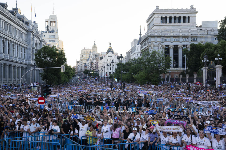 Real Madrid's attend their team's Champions League trophy parade at the Cibeles square in Madrid, Spain, Sunday, June 2, 2024. Real Madrid won against Borussia Dortmund 2-0. (AP Photo/Bernat Armangue)