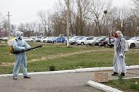 Specialists sanitize a hospital to prevent the spread of the coronavirus disease in Mikhaylovsk