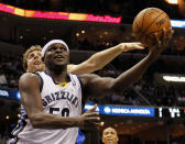 Memphis Grizzlies forward Zach Randolph (50) goes to the basket against Dallas Mavericks forward Dirk Nowitzki (41), of Germany, in the second half of an NBA basketball game Wednesday, April 16, 2014, in Memphis, Tenn. The Grizzlies won in overtime 106-105. (AP Photo/Lance Murphey)