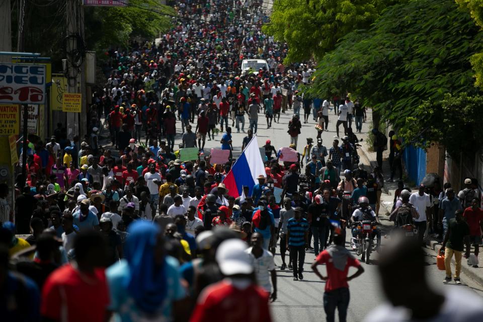 Demonstrators fill the streets during a protest to reject an international military force requested by the government and demand the resignation of Prime Minister Ariel Henry in Port-au-Prince, Haiti, on Monday, Oct. 17, 2022. The United Nations Security Council is evaluating the request by the Haitian government for the immediate deployment of foreign troops to help free Haiti from the grip of gangs that has caused a scarcity of fuel, water, and other basic supplies.