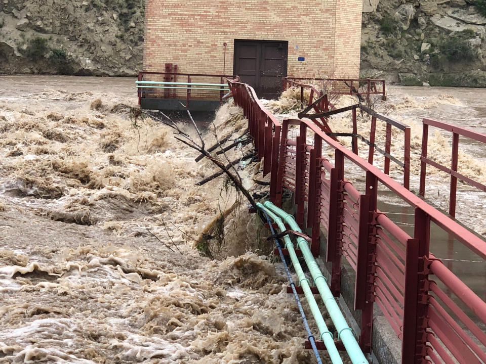 This photo provided by the City of Billings shows flooding at the Billings water plant on Wednesday, June 15, 2022, forcing the city plant to shut down in Billings, Mont. Floodwaters that rushed through Yellowstone National Park and surrounding communities earlier this week are moving through Montana's largest city, flooding farms and ranches and forcing the shutdown of its water treatment plant. The water in the Yellowstone River hit its highest level in nearly a century as it traveled east to Billings, Mont., home to nearly 110,000 people. (City of Billings via AP)