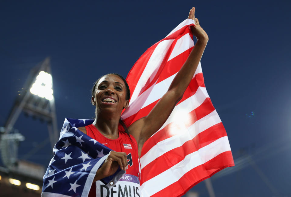 Silver medalist <a href="http://sports.yahoo.com/olympics/track-field/lashinda-demus-1130513/" data-ylk="slk:Lashinda Demus;elm:context_link;itc:0;sec:content-canvas" class="link ">Lashinda Demus</a> of the United States celebrates afte the Women's 400m Hurdles Final on Day 12 of the London 2012 Olympic Games at Olympic Stadium on August 8, 2012 in London, England. (Photo by Clive Brunskill/Getty Images)