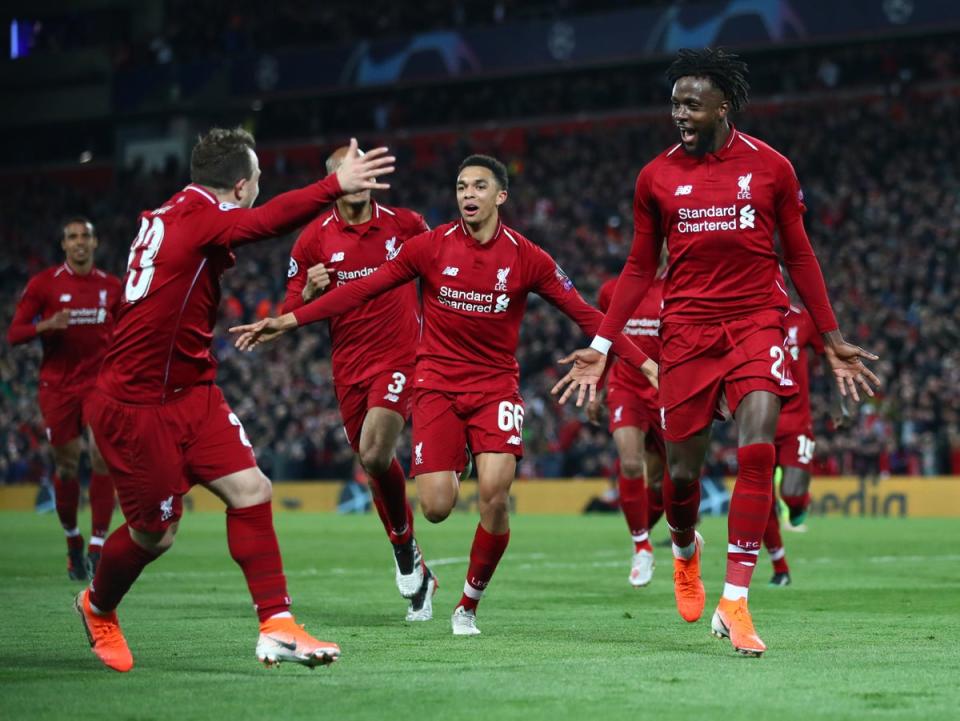 Divock Origi, right, scored Liverpool’s fourth goal on a remarkable night (Getty Images)