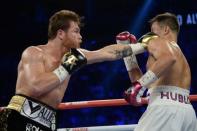 Sep 15, 2018; Las Vegas, NV, USA; Canelo Alvarez (black trunks) and Gennady Golovkin (white trunks) box in the middleweight world championship boxing match at T-Mobile Arena. Alvarez won via majority decision. Mandatory Credit: Joe Camporeale-USA TODAY Sports