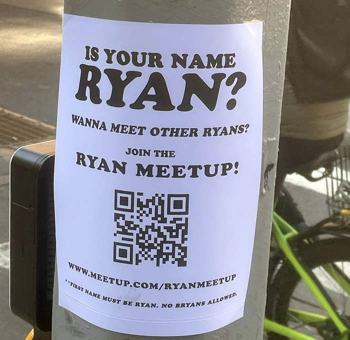 Flyer on a pole asks "Is your name Ryan?" and invites named Ryans to a meetup, with a QR code for details