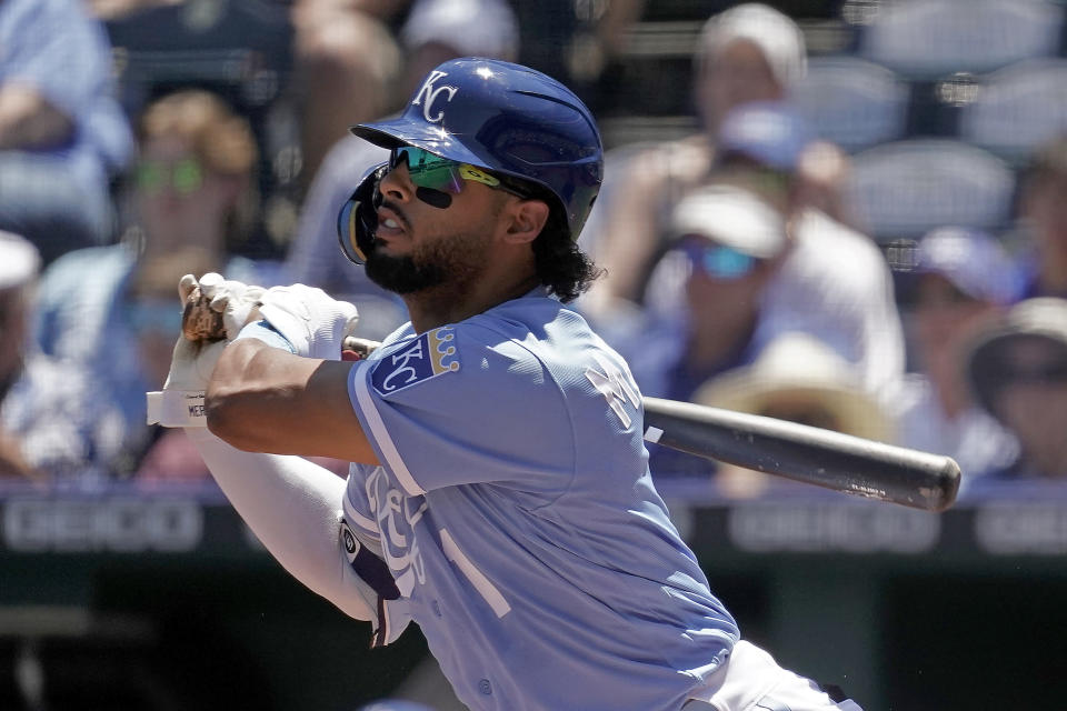 Kansas City Royals' MJ Melendez hits an RBI single during the first inning of a baseball game against the Texas Rangers Wednesday, June 29, 2022, in Kansas City, Mo. (AP Photo/Charlie Riedel)
