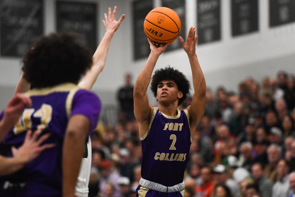 Fort Collins' Jayce King (2) sinks a three pointer in a boys high school basketball game against Fossil Ridge at Fossil Ridge High School on Tuesday, Jan. 31, 2023 in Fort Collins, Colo.