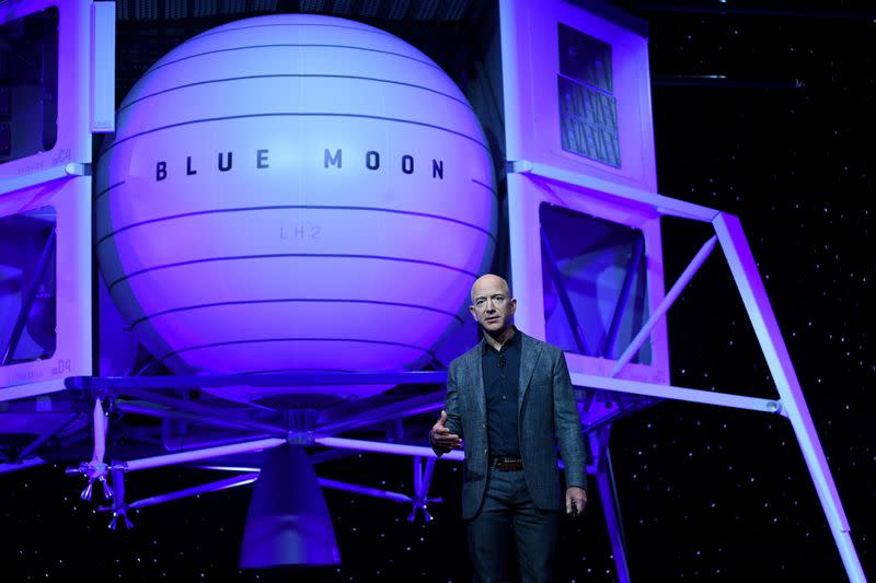 FILE PHOTO: Founder, Chairman, CEO and President of Amazon Jeff Bezos unveils his space company Blue Origin's space exploration lunar lander rocket called Blue Moon during an unveiling event in Washington