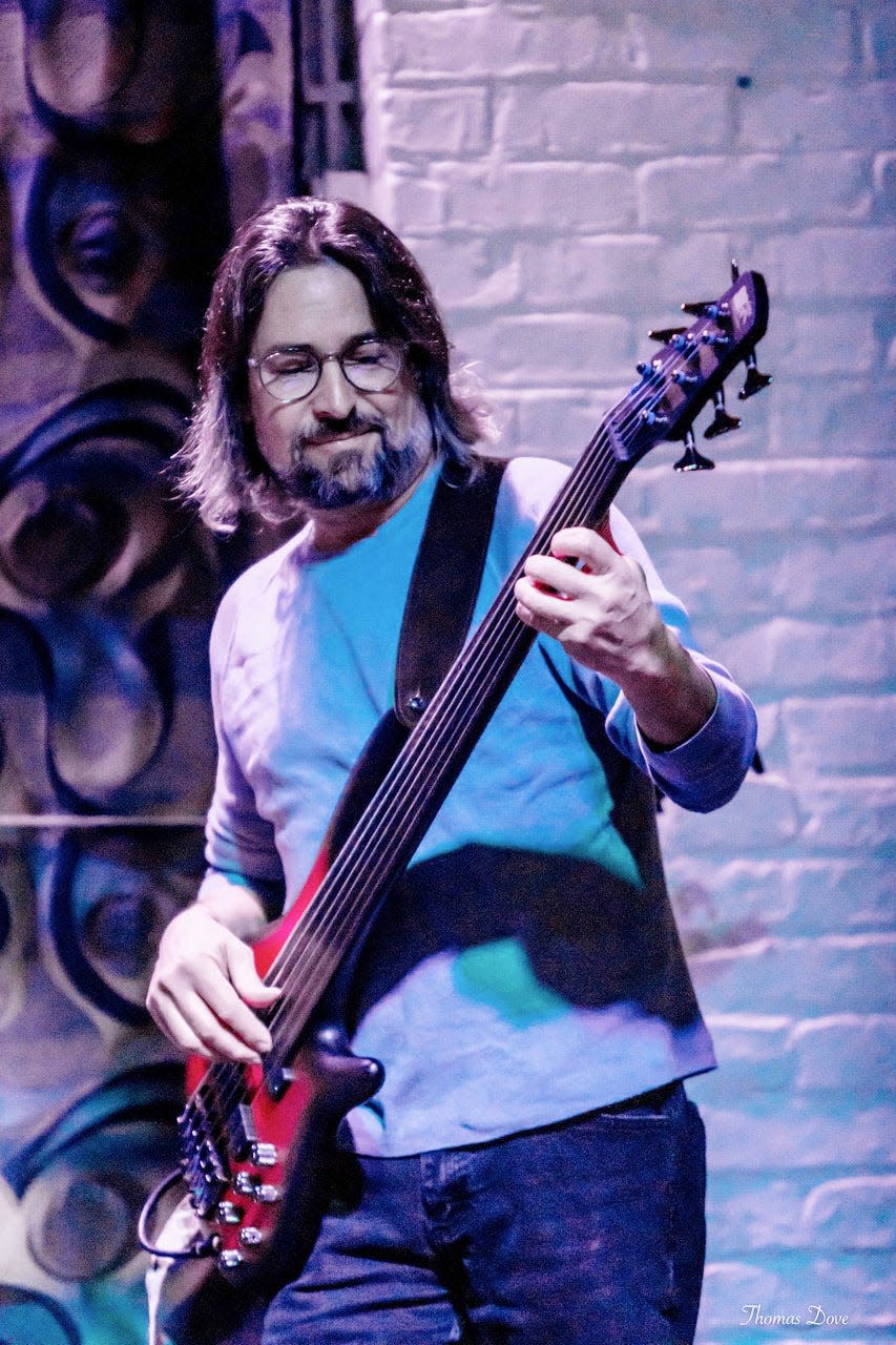 Ron Kadish plays the bass at the Slippery Noodle in Indianapolis. He is one of the founding members of Hoosier Original Music Association, also known as HooMac.