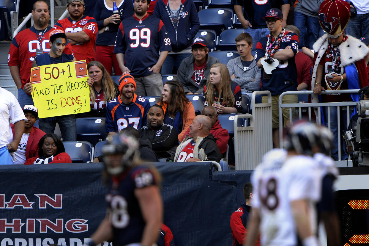 HOUSTON, TX. - December 22: Fan waiting for quarterback Peyton Manning #18 of the Denver Broncos to break the record against the Houston Texans at Reliant Stadium December 22, 2013 Houston, Texas. (Photo By Joe Amon/The Denver Post via Getty Images)