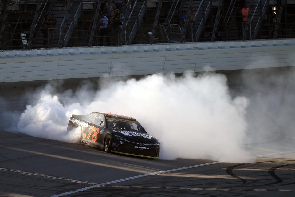 Martin Truex Jr. celebrates after winning Sunday (Getty). 