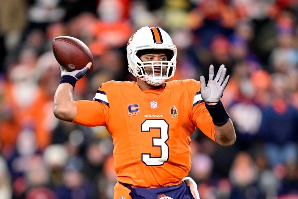 Quarterback Russell Wilson #3 of the Denver Broncos passes during the 1st quarter of the game against the New England Patriots at Empower Field At Mile High on December 24, 2023 in Denver, Colorado. Getty Images