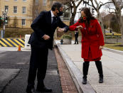 Newly confirmed U.S. Secretary of State Antony Blinken is greeted with an elbow bump as he arrives for a welcome ceremony at the State Department, Wednesday, Jan. 27, 2021 in Washington. (Carlos Barria/Pool via AP)