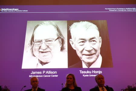 The Nobel Prize laureates for Medicine or Physiology 2018 are James P. Allison, U.S. and Tasuku Honjo, Japan presented at the Karolinska Institute in Stockholm, Sweden October 1, 2018. TT News Agency/Fredrik Sandberg via REUTERS ATTENTION EDITORS - THIS IMAGE WAS PROVIDED BY A THIRD PARTY. SWEDEN OUT. NO COMMERCIAL OR EDITORIAL SALES IN SWEDEN.