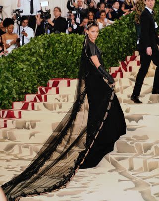At the 2018 Met Gala, Bella Hadid wore a Chrome Hearts gown with a coordinating Chrome Hearts x Gareth Pugh veil. On her Instagram story, she said, 