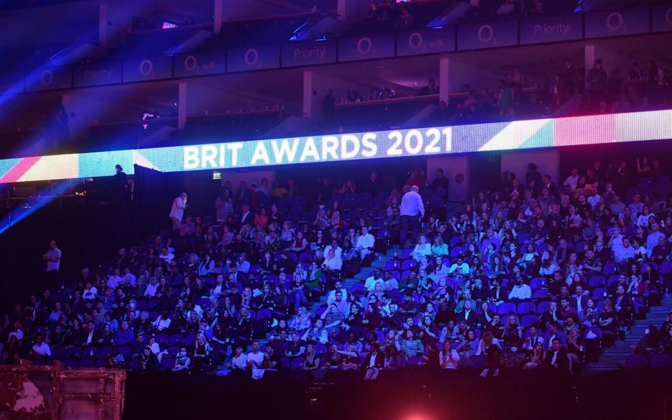 People in the crowd during the Brit Awards 2021 at the O2 Arena, London - Ian West/PA