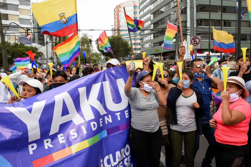 Supporters of Ecuador's presidential candidate Yaku Perez gather outside a hotel, in Quito