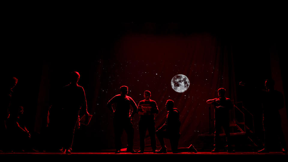 Inmates perform in the final rehearsal of the State of Siege, by French author Albert Camus, a play describing the arrival of plague in Spain which brings a totalitarian regime to power, at the Nottara Theatre in Bucharest, Romania, Wednesday, Nov. 24, 2021. Performing on the main stage of the reputed Nottara Theatre downtown Bucharest is a dream opportunity for any Romanian aspiring artist – getting to do that as a convicted inmate is a breakthrough.(AP Photo/Andreea Alexandru)