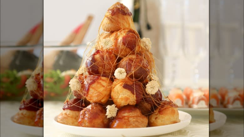 Close-up of a decorated croquembouche stack