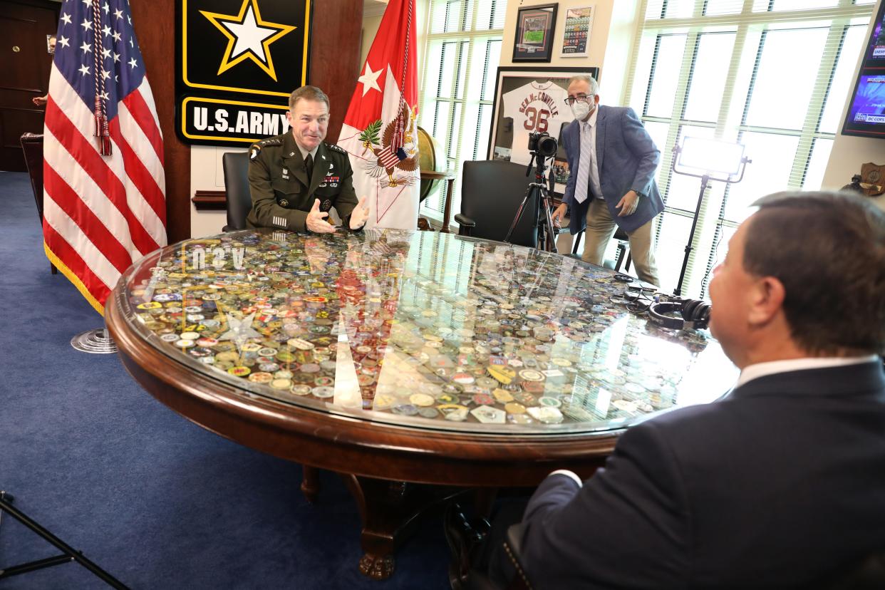 Quincy Mayor Thomas Koch interviews Gen. James C. McConville at the Pentagon.