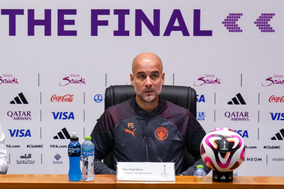 Manchester City's head coach Pep Guardiola attends a press conference at the King Abdullah Sports City Stadium in Jeddah, Saudi Arabia, Thursday, Dec. 21, 2023. Manchester City will play against Fluminense during the final soccer match of the Club World Cup on Friday Dec. 21. (AP Photo/Manu Fernandez)