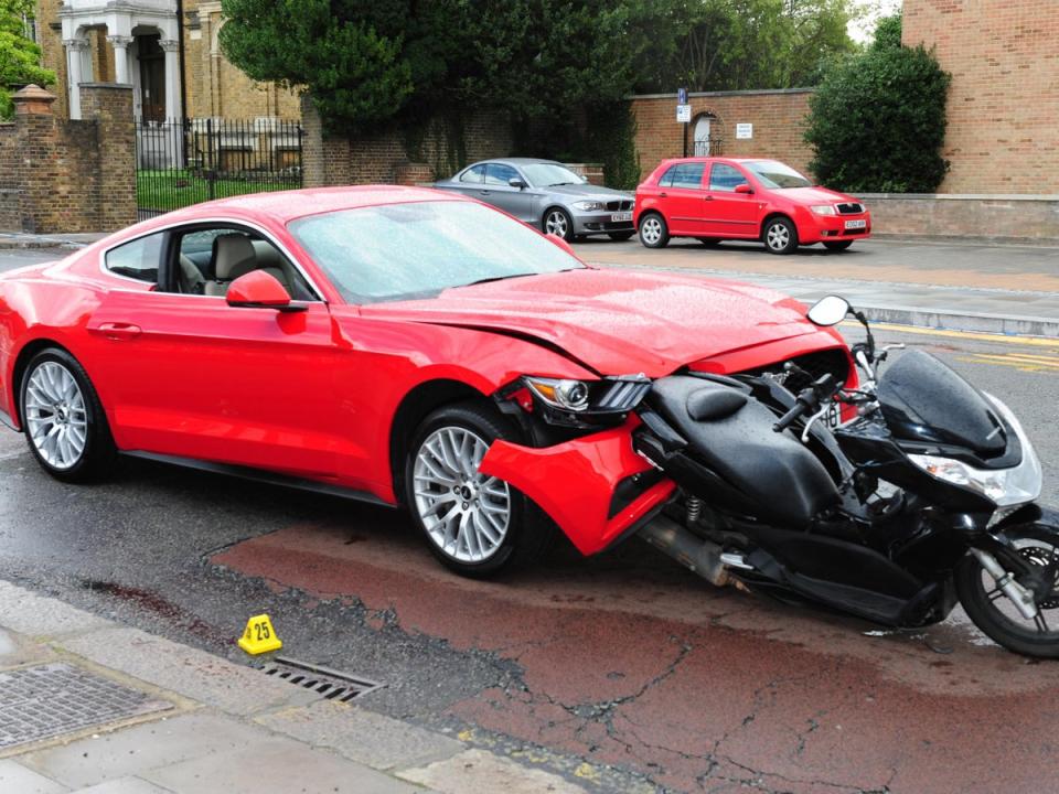 Bradley Clifford's red Ford Mustang after he crashed it into the moped carrying Soban Khan and Jahshua Francis in Enfield (Metropolitan Police)