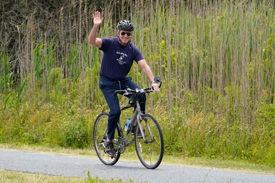 President Joe Biden, with first lady Jill Biden, not shown, takes a bike ride near Rehoboth Beach, Del., Thursday, June 3, 2021. The Bidens are spending a few days in Rehoboth Beach to celebrate first lady Jill Biden's 70th birthday.