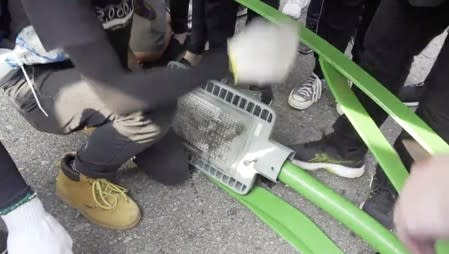 A smart lamppost is pulled and demolished in Kwun Tong in Hong Kong