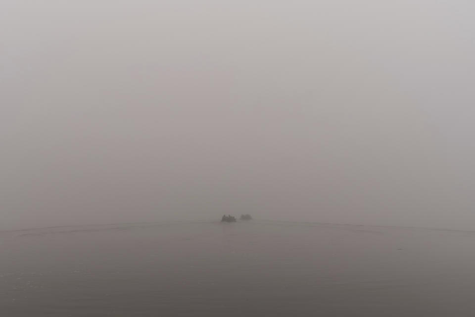 FILE - Two boats of Ukrainian marines navigate along the Dnipro river close to the frontline near Kherson, Ukraine, Saturday, Oct. 14, 2023. A top Ukrainian official said Wednesday, Nov. 15, 2023, its troops have established a beachhead on the eastern bank of the Dnieper River near Kherson, an important advance in bridging one of Russia's most significant strategic barriers in the war. (AP Photo/Alex Babenko, File)